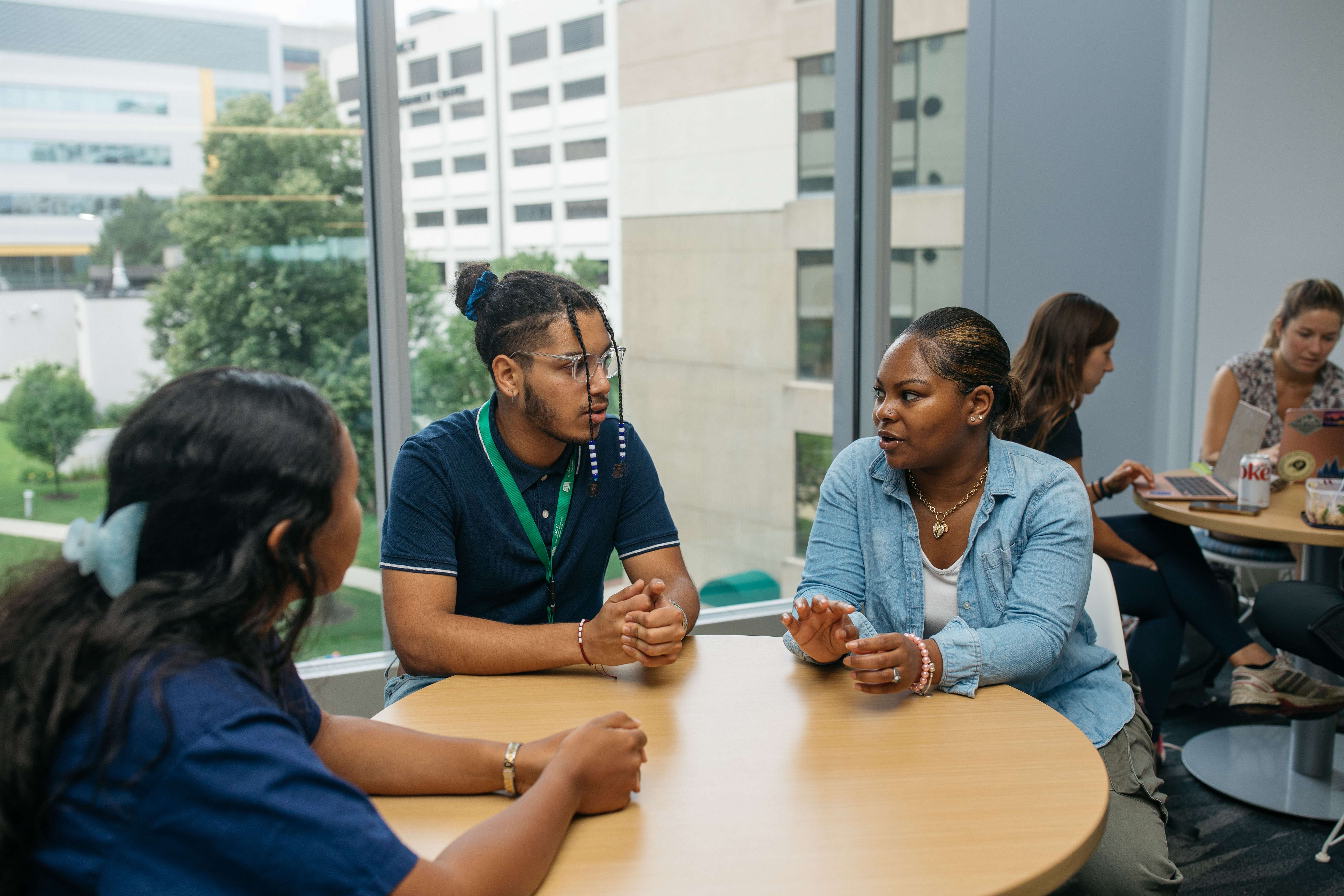 students sitting at table